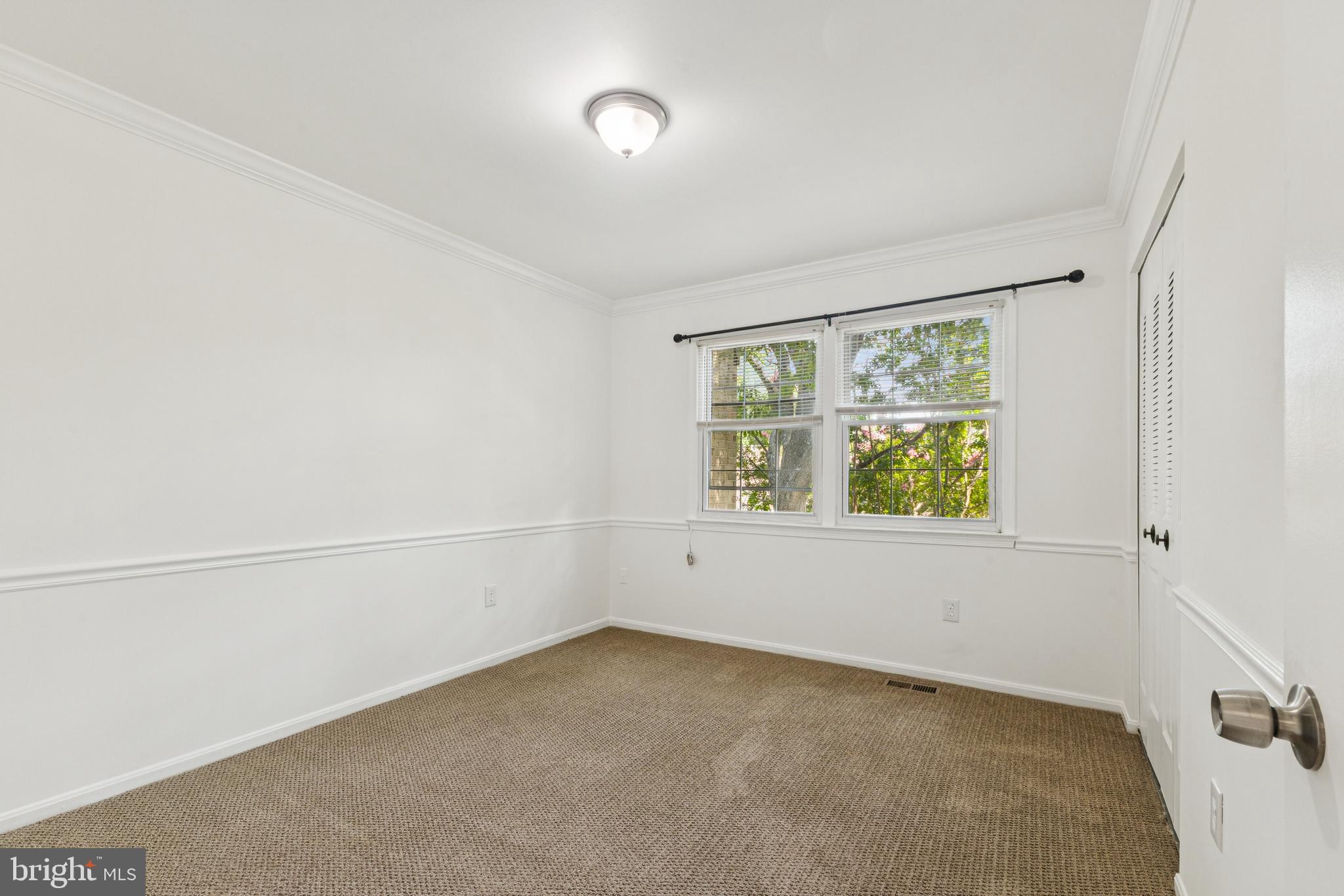 10271 Braddock Road Fairfax, VA 22032 - Photo 17 of 25 an empty room with windows