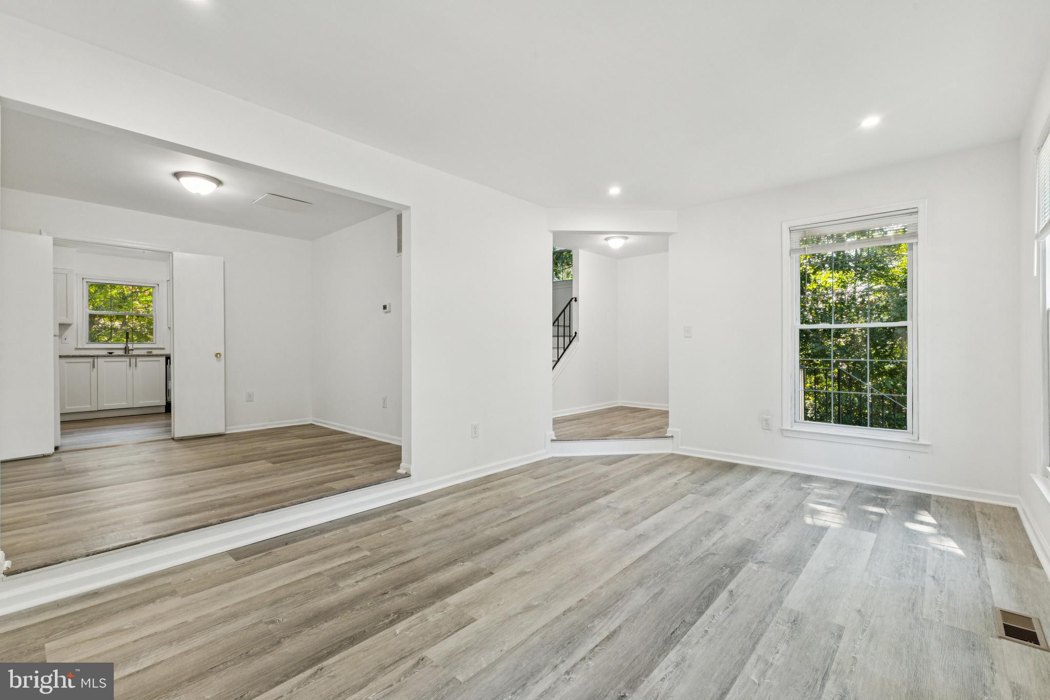 10271 Braddock Road Fairfax, VA 22032 - Photo 2 of 25 wooden floor in an empty room with a window