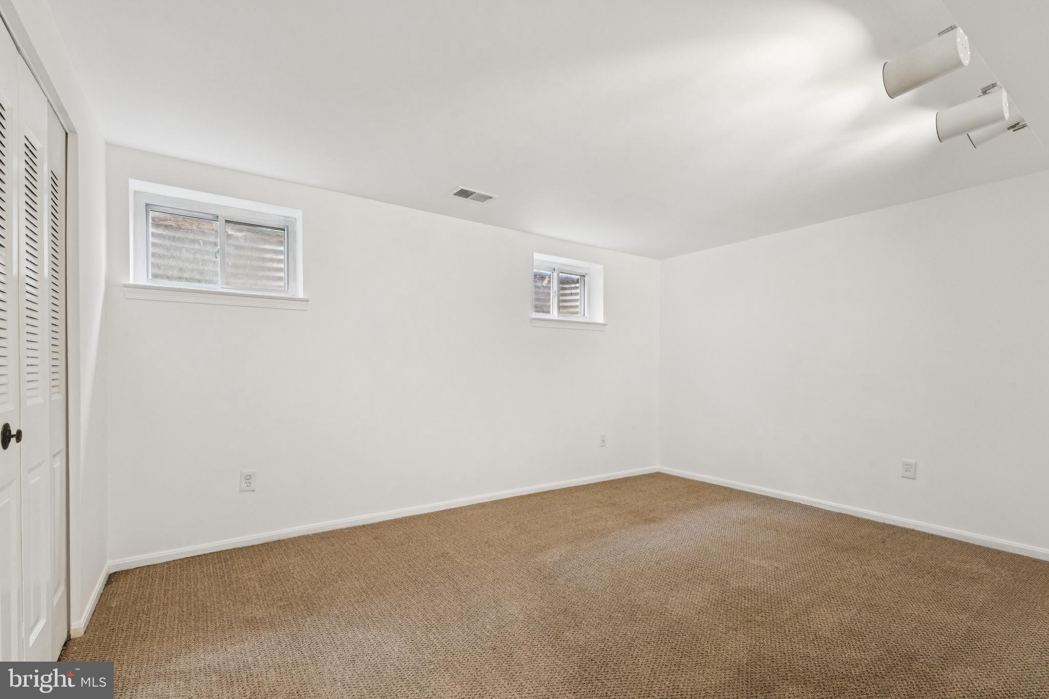 10271 Braddock Road Fairfax, VA 22032 - Photo 23 of 25 an empty room with a workbench