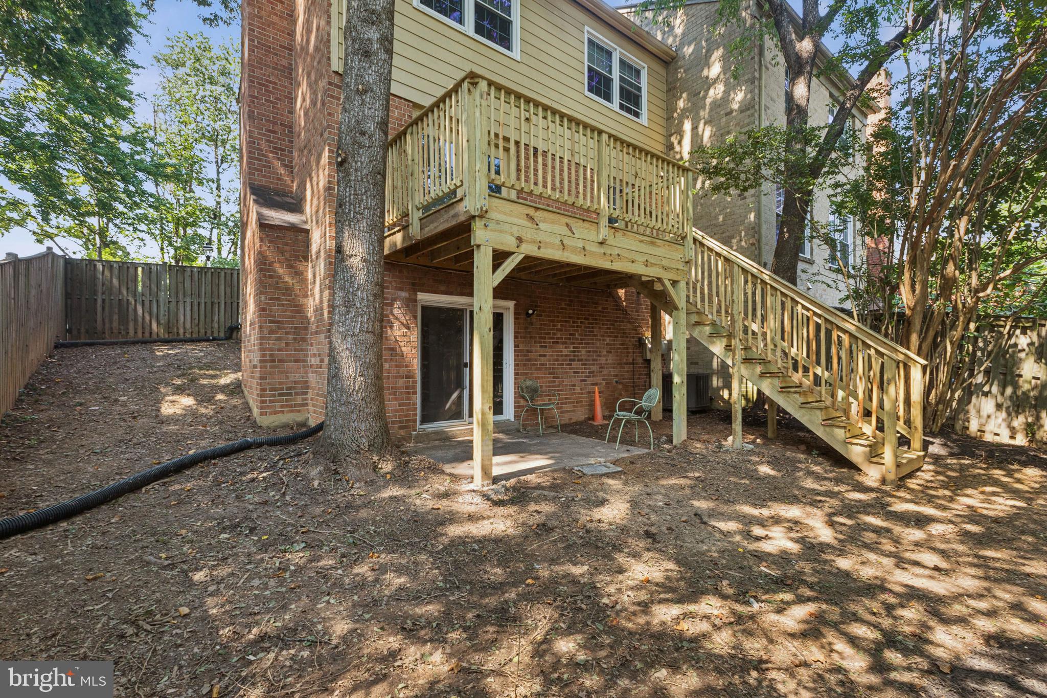10271 Braddock Road Fairfax, VA 22032 - Photo 25 of 25 a view of a house with a yard