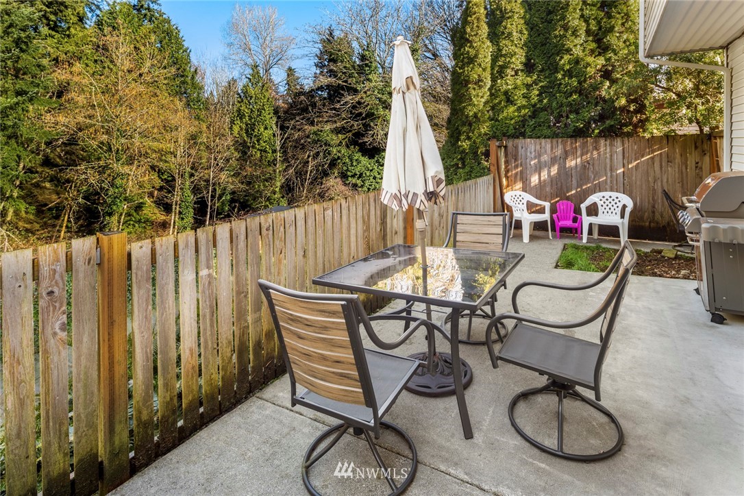 21310 2nd Avenue Southeast Bothell, WA 98021 - Photo 22 of 22 a view of a chairs and table in backyard