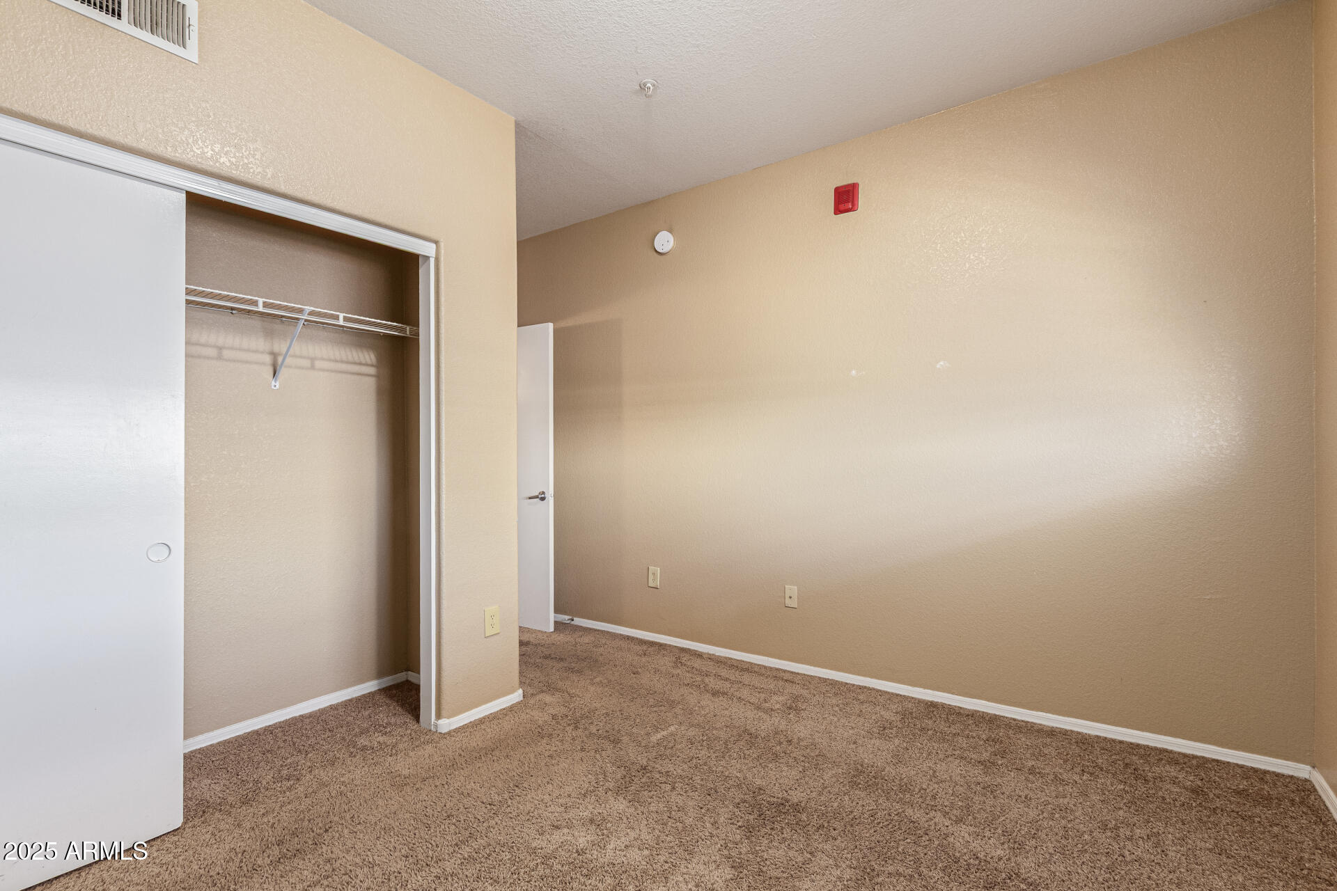 3434 East Baseline Road, Unit 331 Phoenix, AZ 85042 - Photo 14 of 37 a view of an empty room