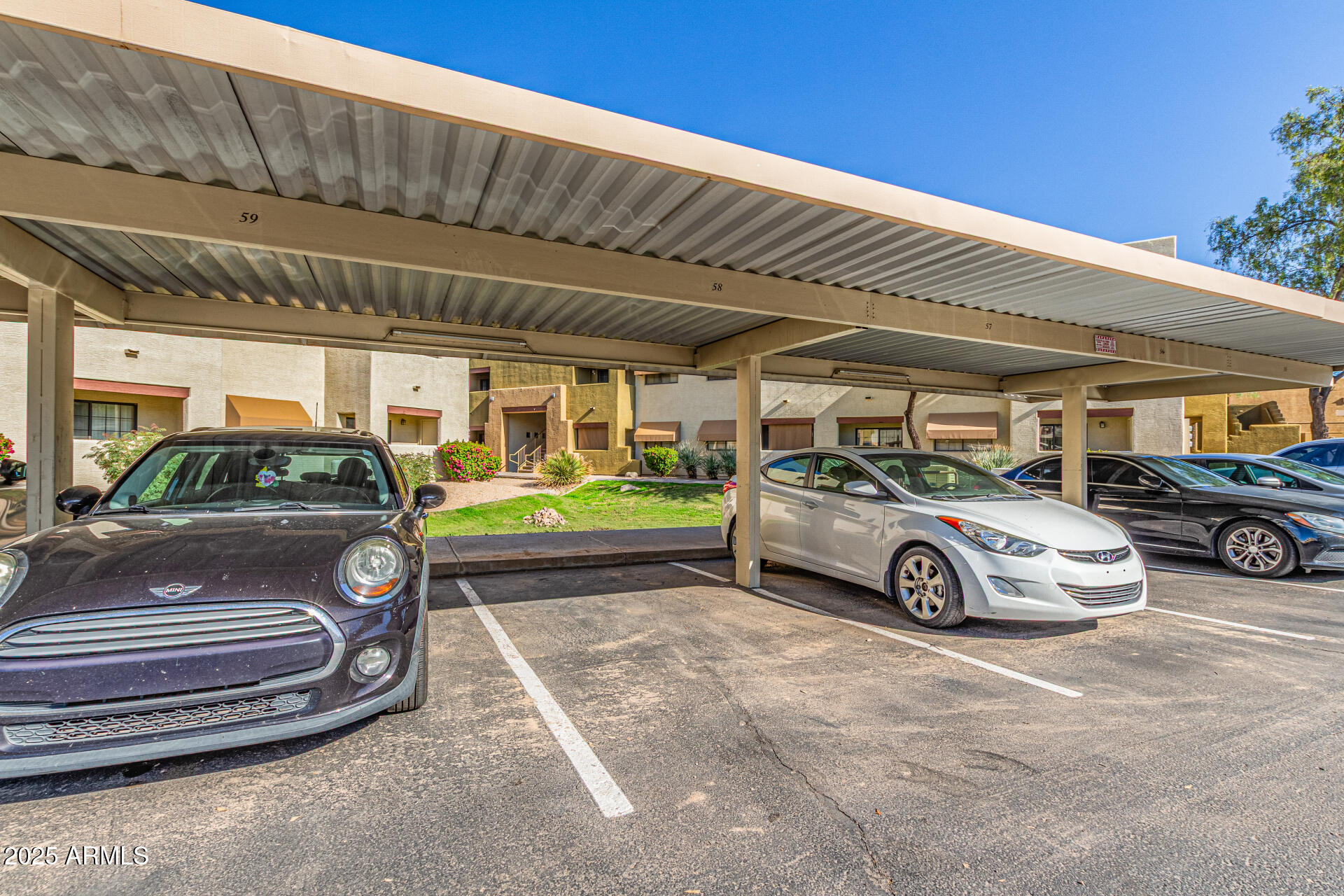 3434 East Baseline Road, Unit 331 Phoenix, AZ 85042 - Photo 18 of 37 a view of a cars parking space