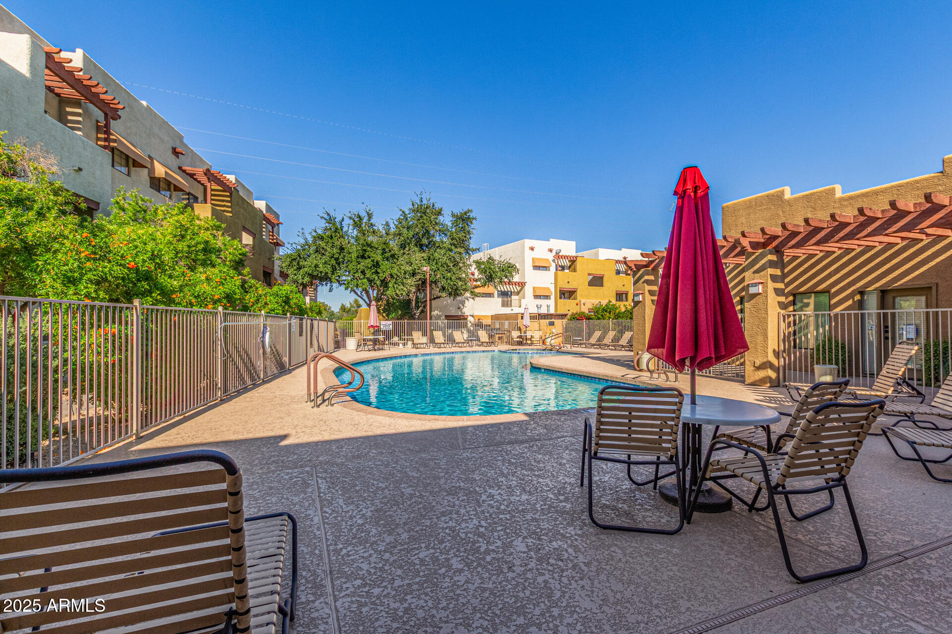 3434 East Baseline Road, Unit 331 Phoenix, AZ 85042 - Photo 22 of 37 a view of a chairs and table in the terrace