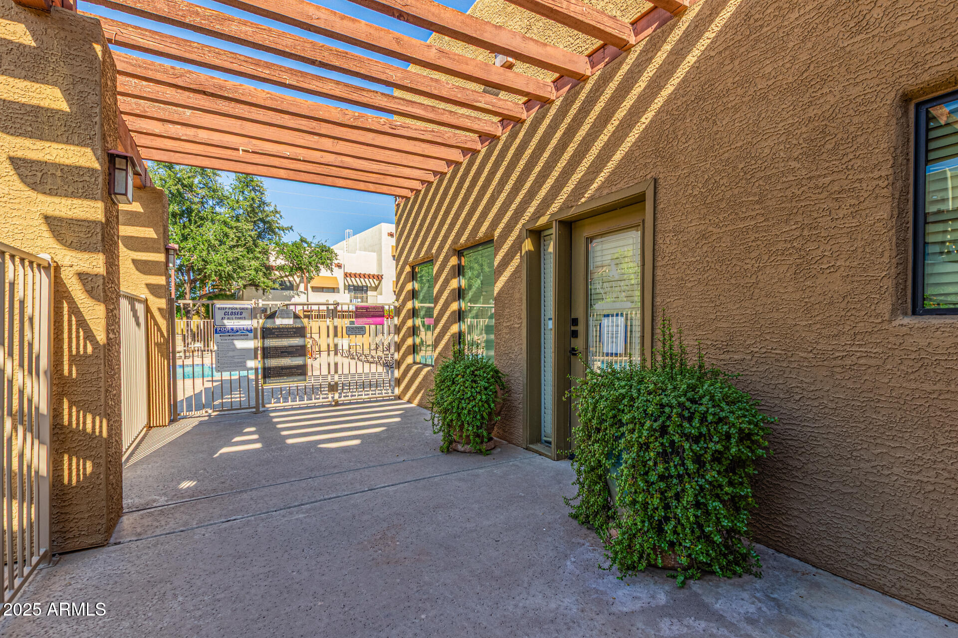 3434 East Baseline Road, Unit 331 Phoenix, AZ 85042 - Photo 23 of 37 a view of a house with a yard