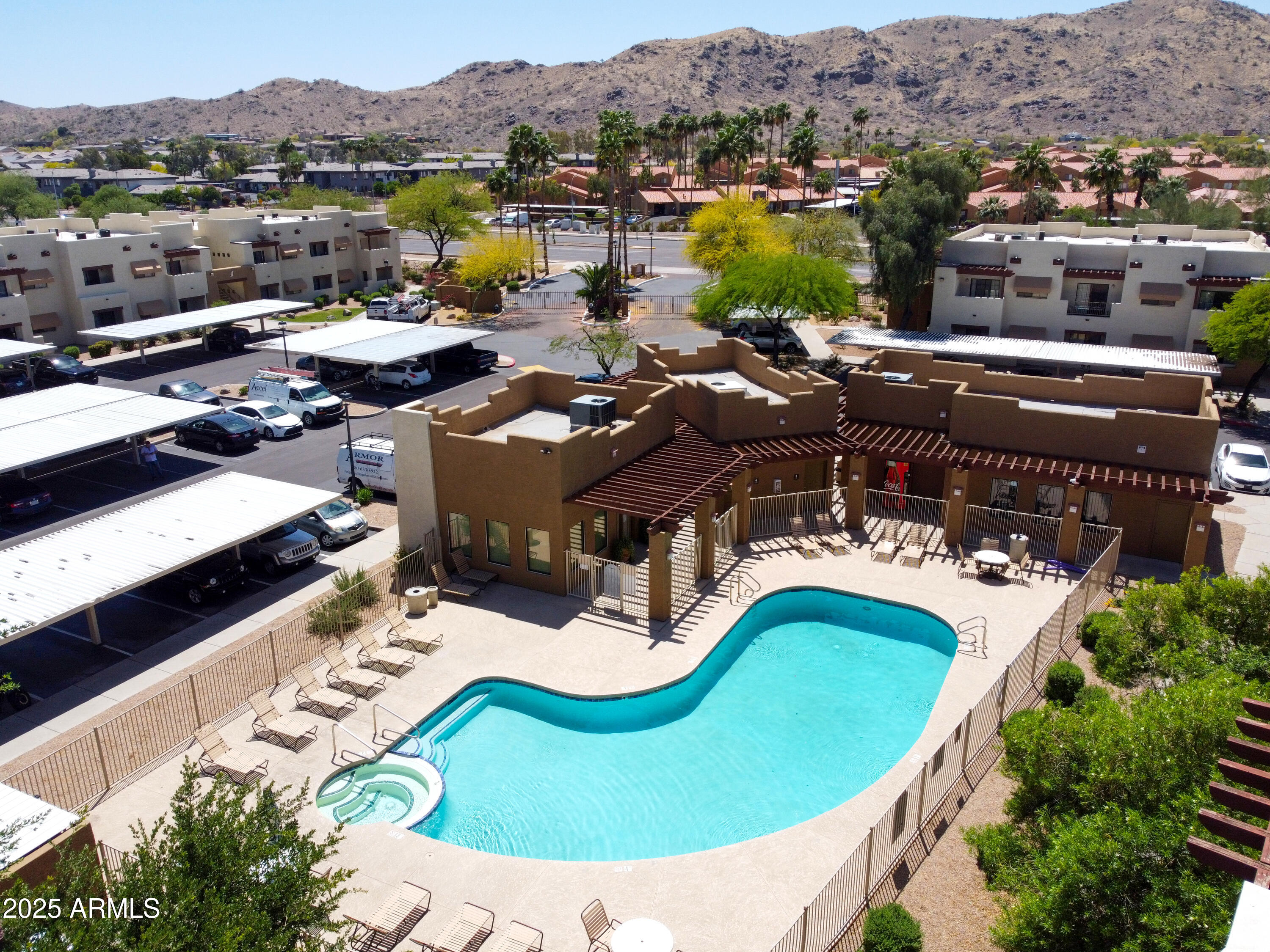 3434 East Baseline Road, Unit 331 Phoenix, AZ 85042 - Photo 30 of 37 a view of a swimming pool with a lake view