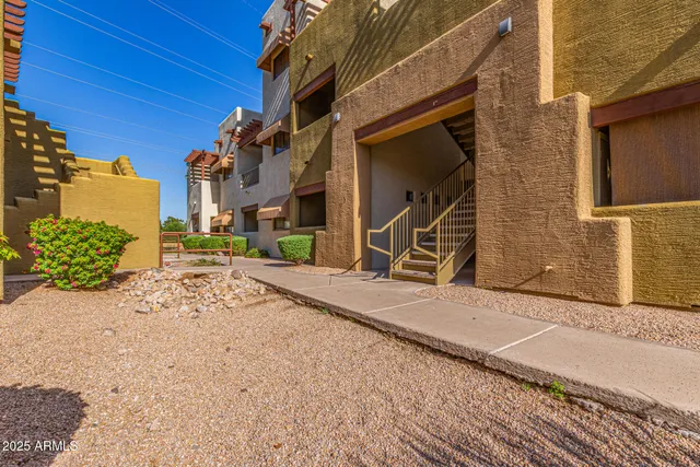 a view of a house with a street