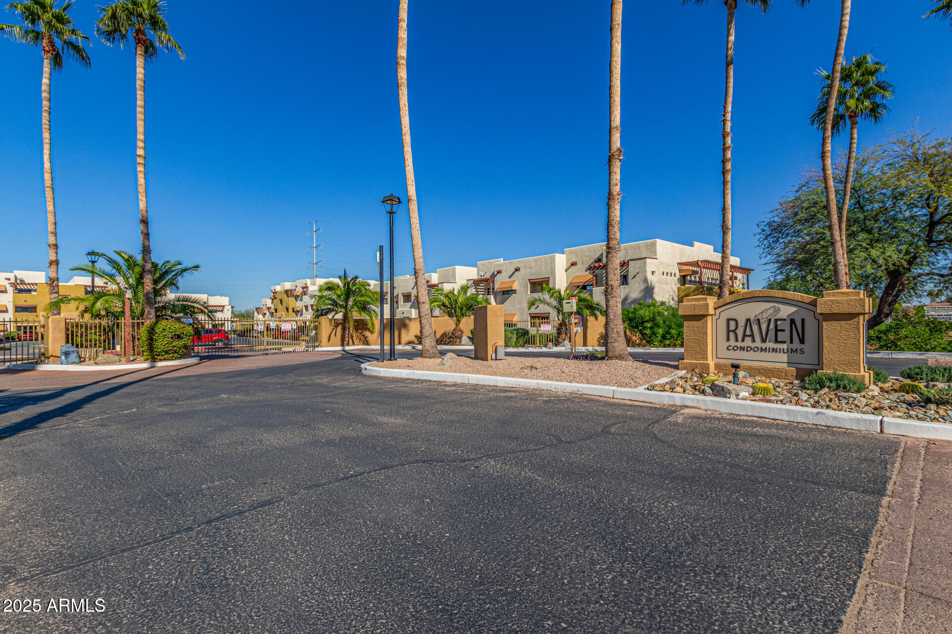 3434 East Baseline Road, Unit 331 Phoenix, AZ 85042 - Photo 35 of 37 a front view of a house with a yard