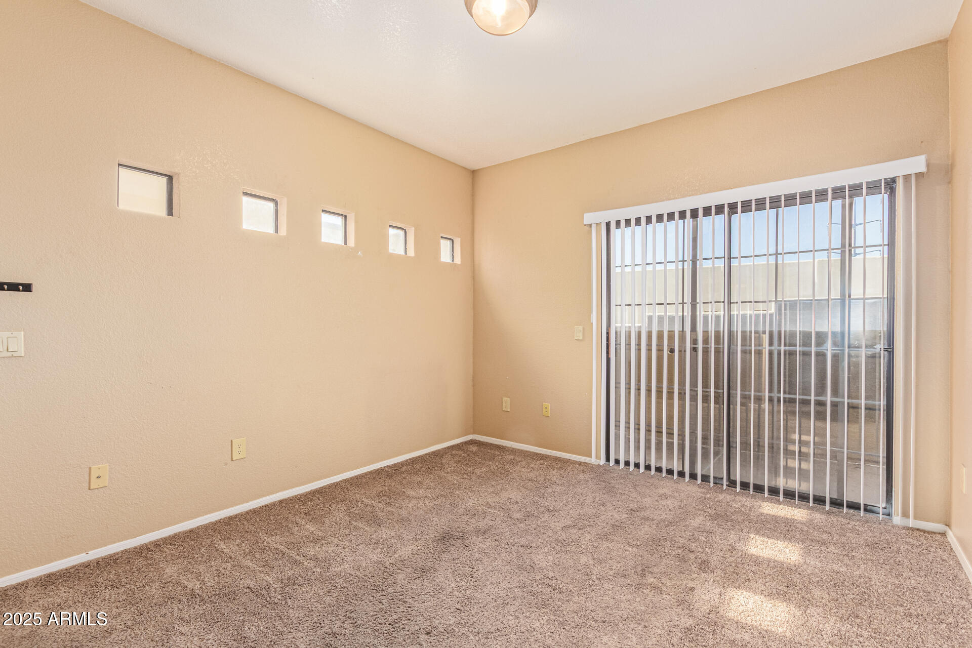3434 East Baseline Road, Unit 331 Phoenix, AZ 85042 - Photo 7 of 37 a view of an empty room