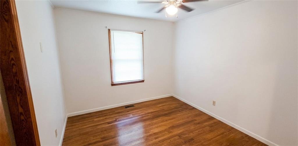 389 Collins Road Toccoa, GA 30577 - Photo 8 of 15 an empty room with a window