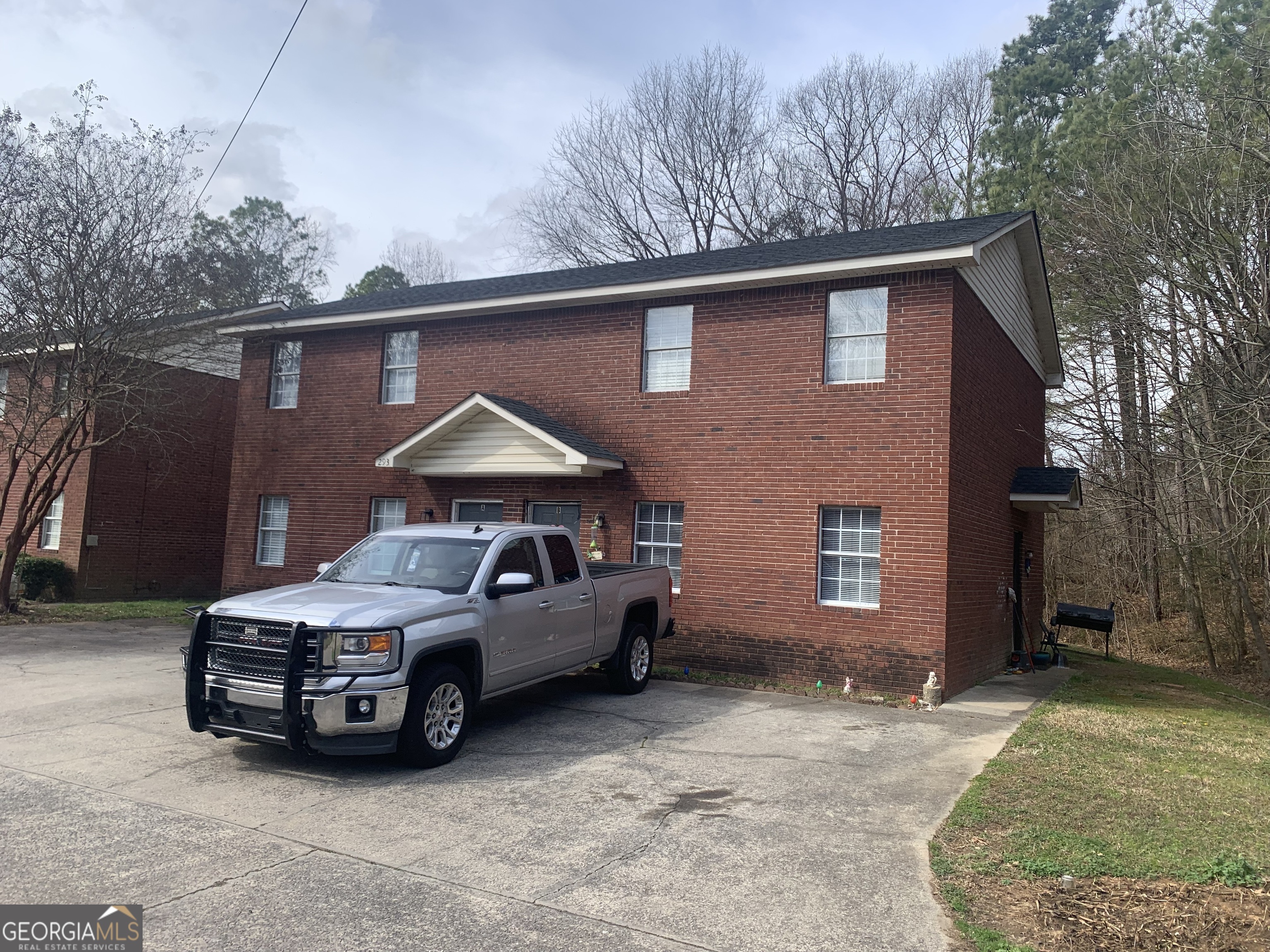 301 B Bert Road Northeast Rome, GA 30161 - Photo 4 of 6 a car parked in front of house