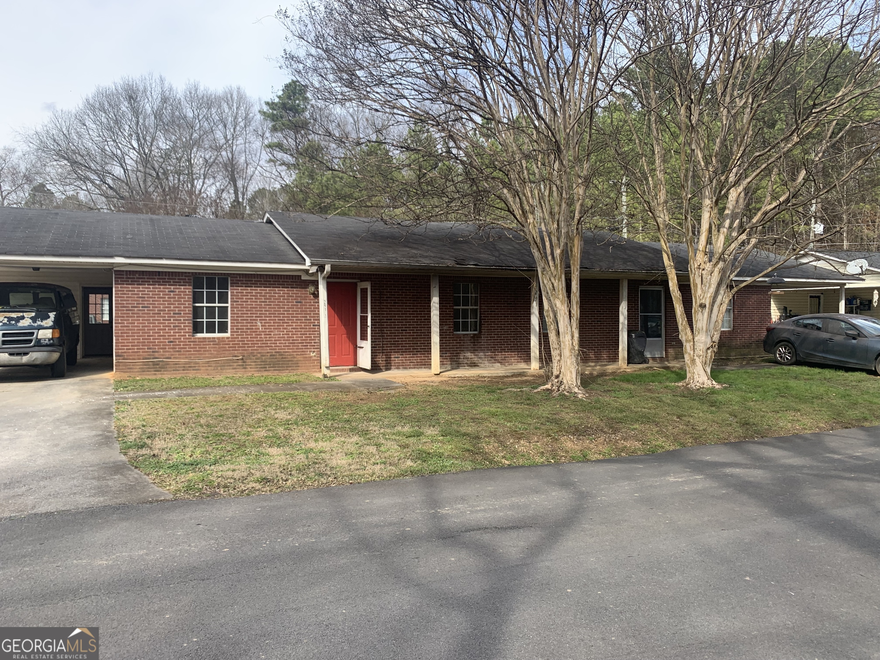 301 B Bert Road Northeast Rome, GA 30161 - Photo 5 of 6 a front view of a house with garage