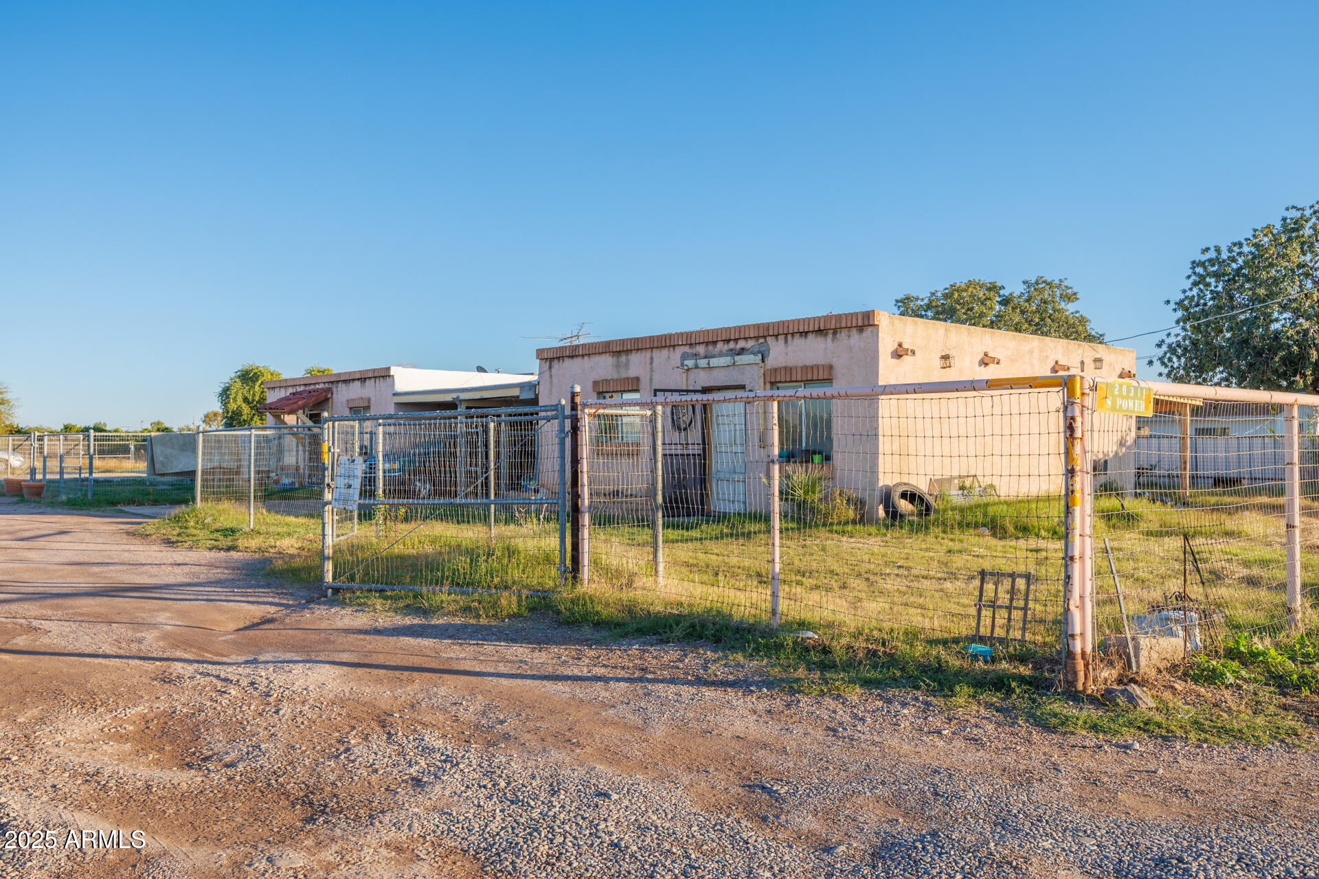 a view of a swimming pool with a yard