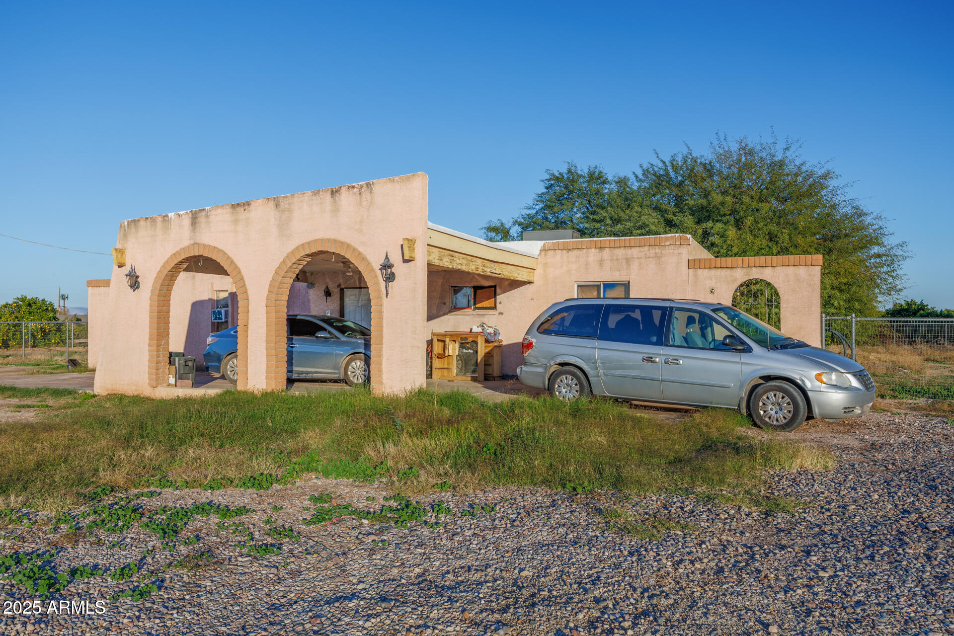 26311 South Power Road Queen Creek, AZ 85142 - Photo 7 of 20 a front view of a house with garden