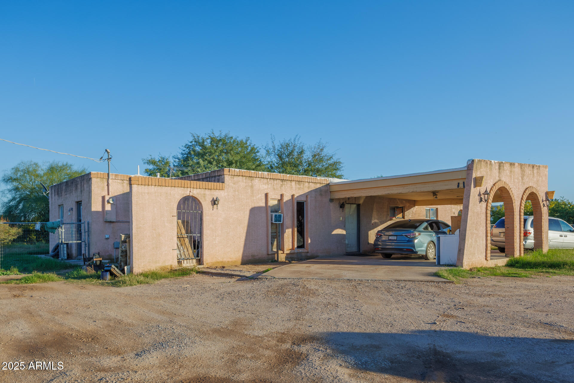 26311 South Power Road Queen Creek, AZ 85142 - Photo 8 of 20 a view of a car park in front of house
