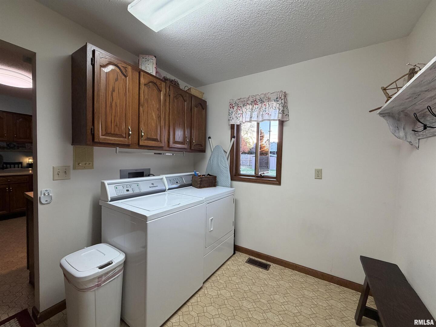 206 Daras Drive Carmi, IL 62821 - Photo 18 of 33 a storage room with washer and dryer