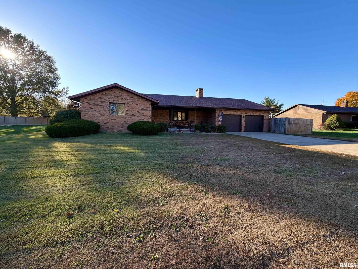 206 Daras Drive Carmi, IL 62821 - Photo 2 of 33 a view of a house with yard and sitting area