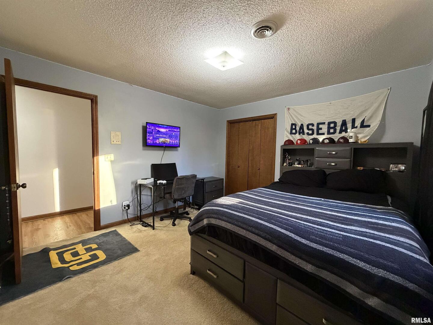 206 Daras Drive Carmi, IL 62821 - Photo 25 of 33 a bedroom with bed and a chandelier