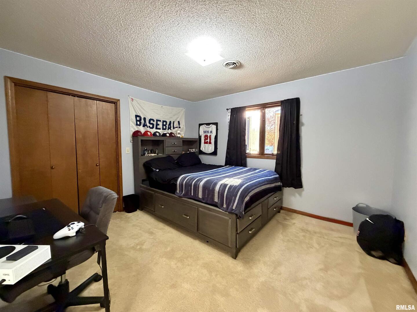 206 Daras Drive Carmi, IL 62821 - Photo 26 of 33 a bedroom with a bed window and couch