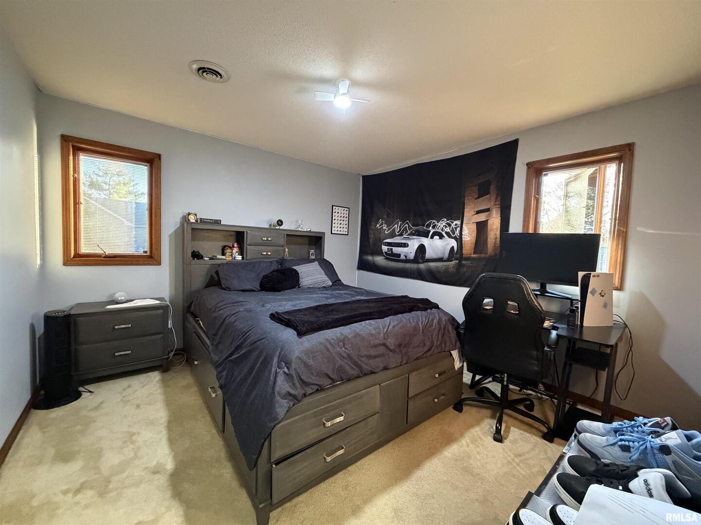 206 Daras Drive Carmi, IL 62821 - Photo 30 of 33 a bedroom with a bed and window