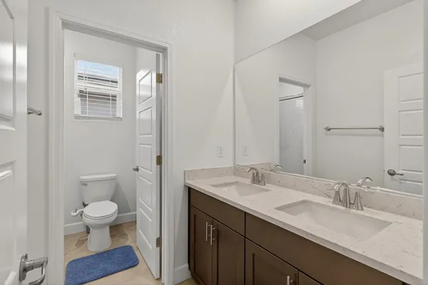 a bathroom with a shower and a sink