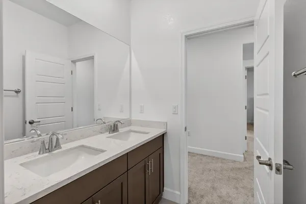 a white bath tub sitting next to a window