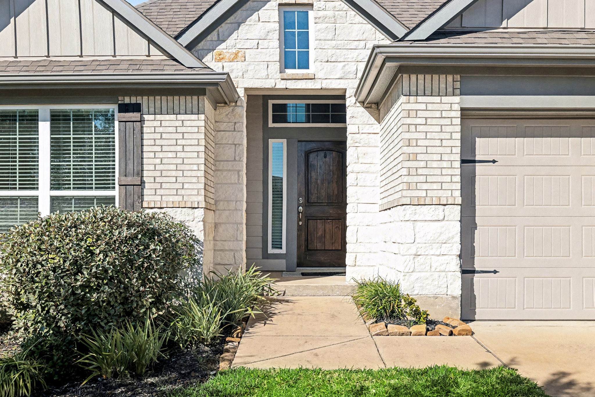 3309 Rolling View Court Conroe, TX 77301 - Photo 4 of 27 Beautiful front entryway featuring stone and brick exterior.