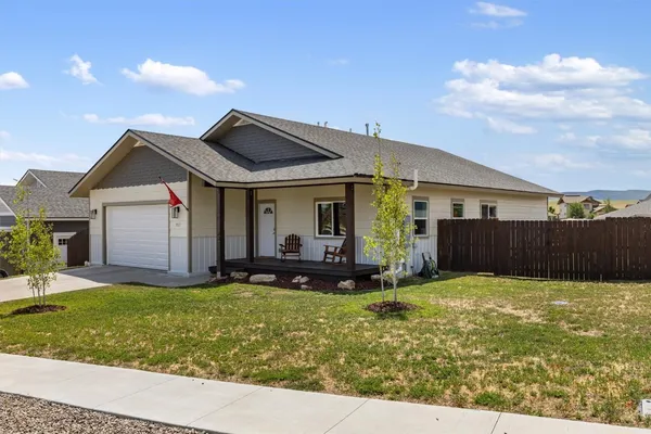 a view of a swimming pool with a lounge chair