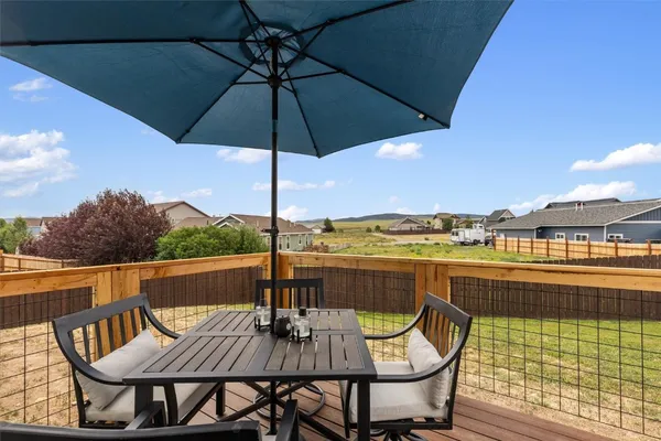 a view of roof deck with seating space
