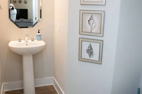 a bathroom with a sink and mirror
