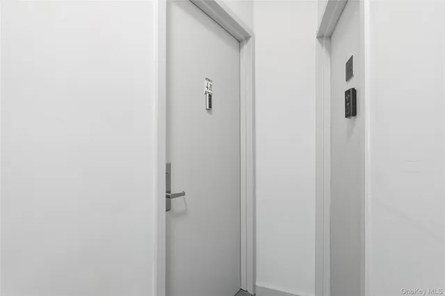 a bathroom with a sink double vanity and a mirror