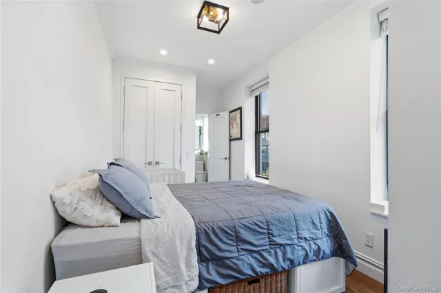 a living room with a couch and a flat screen tv