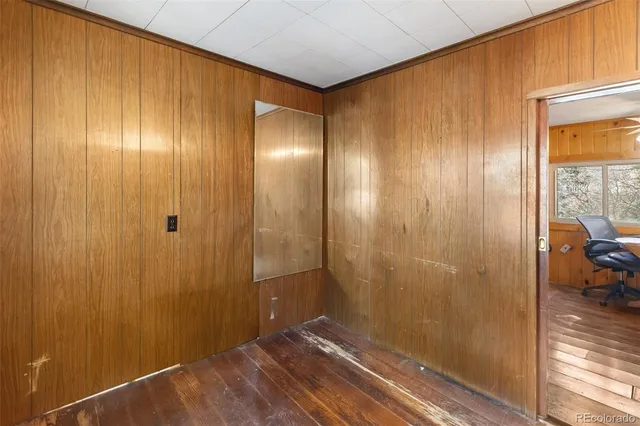 a view of entryway with wooden floor