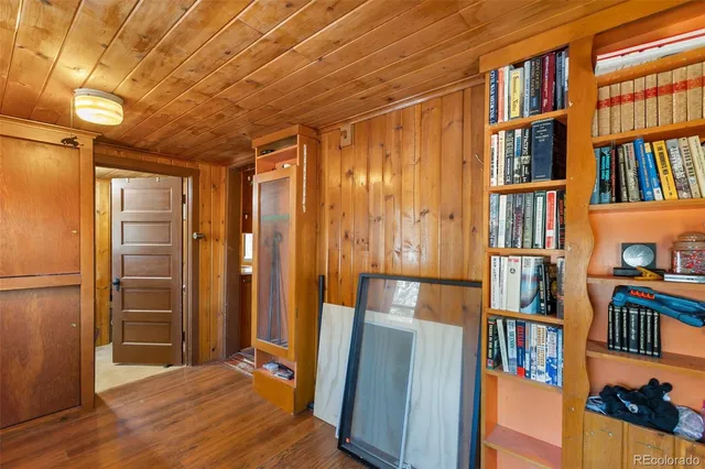 a view of front door with wooden floor