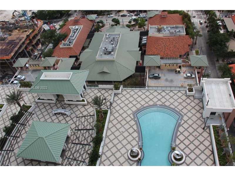 999 Southwest 1st Avenue, Unit 2502 Miami, FL 33130 - Photo 6 of 10 an aerial view of a house with garden space sitting space and swimming pool