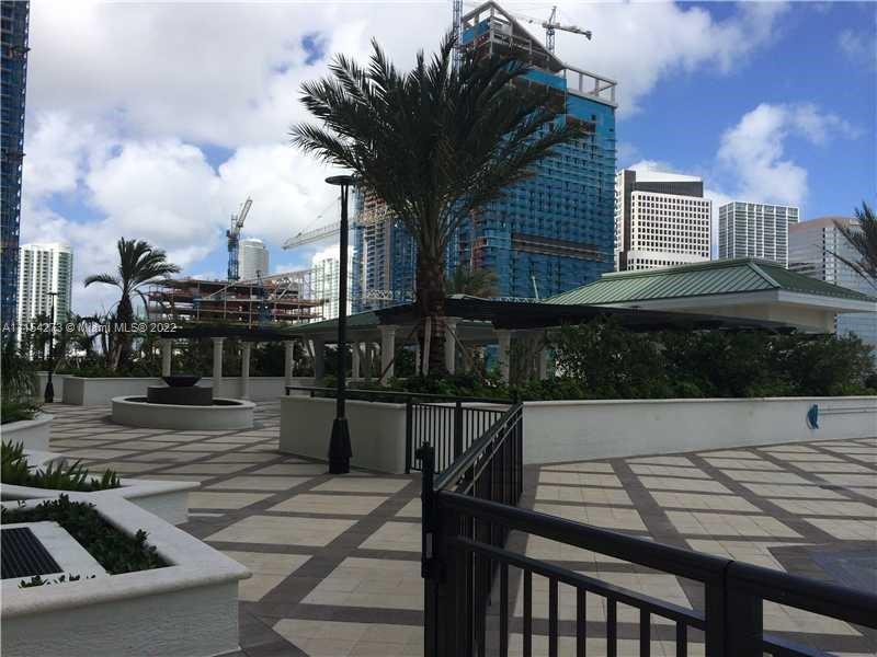 999 Southwest 1st Avenue, Unit 2502 Miami, FL 33130 - Photo 9 of 10 a view of a terrace with sitting area