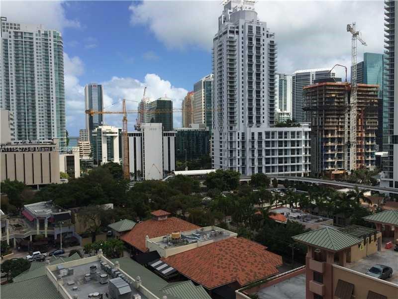 999 Southwest 1st Avenue, Unit 2502 Miami, FL 33130 - Photo 10 of 10 a view of a city with tall buildings