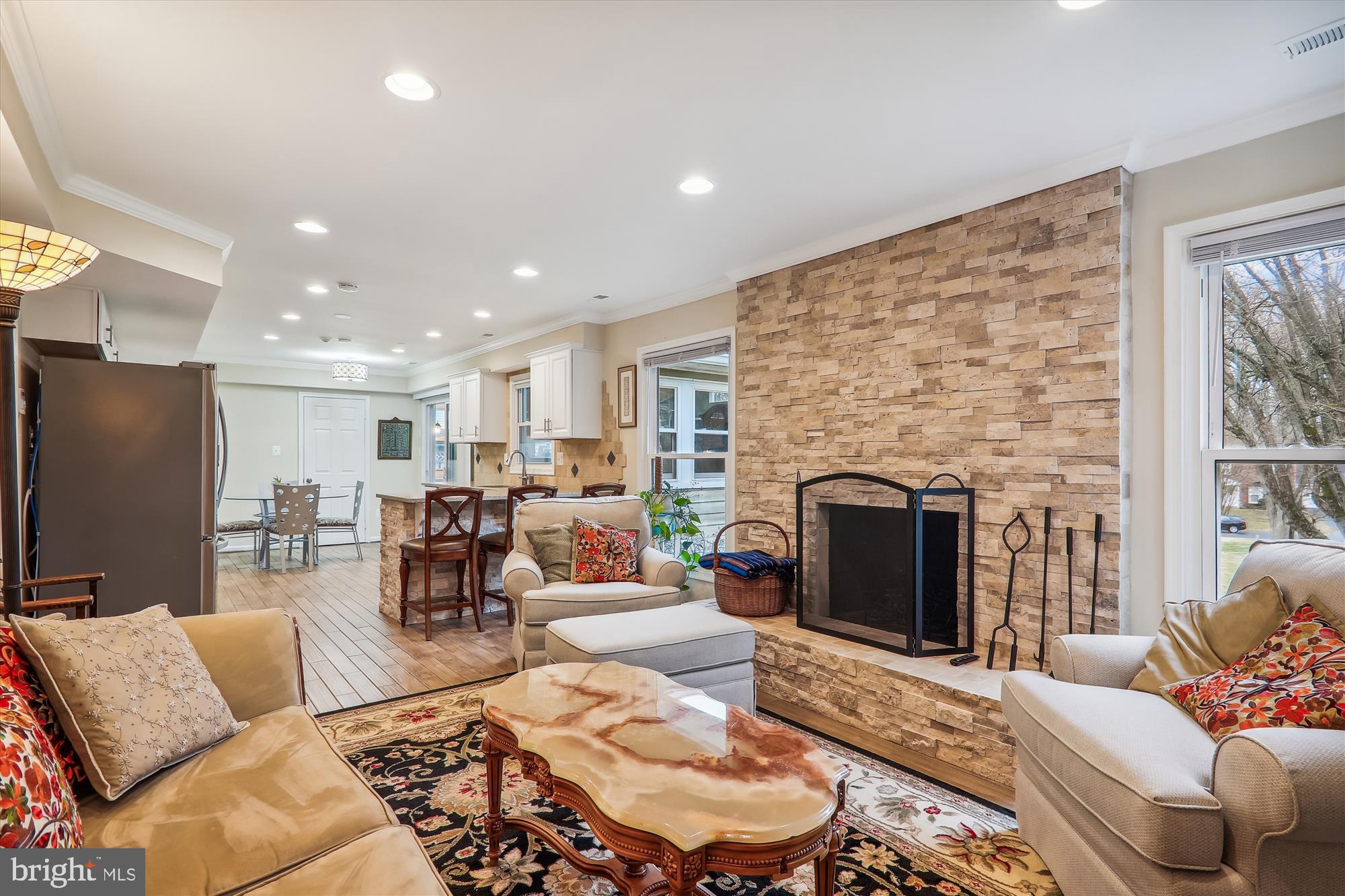 2804 Hewitt Avenue Silver Spring, MD 20906 - Photo 13 of 34 Family Room with fireplace and travertine tile