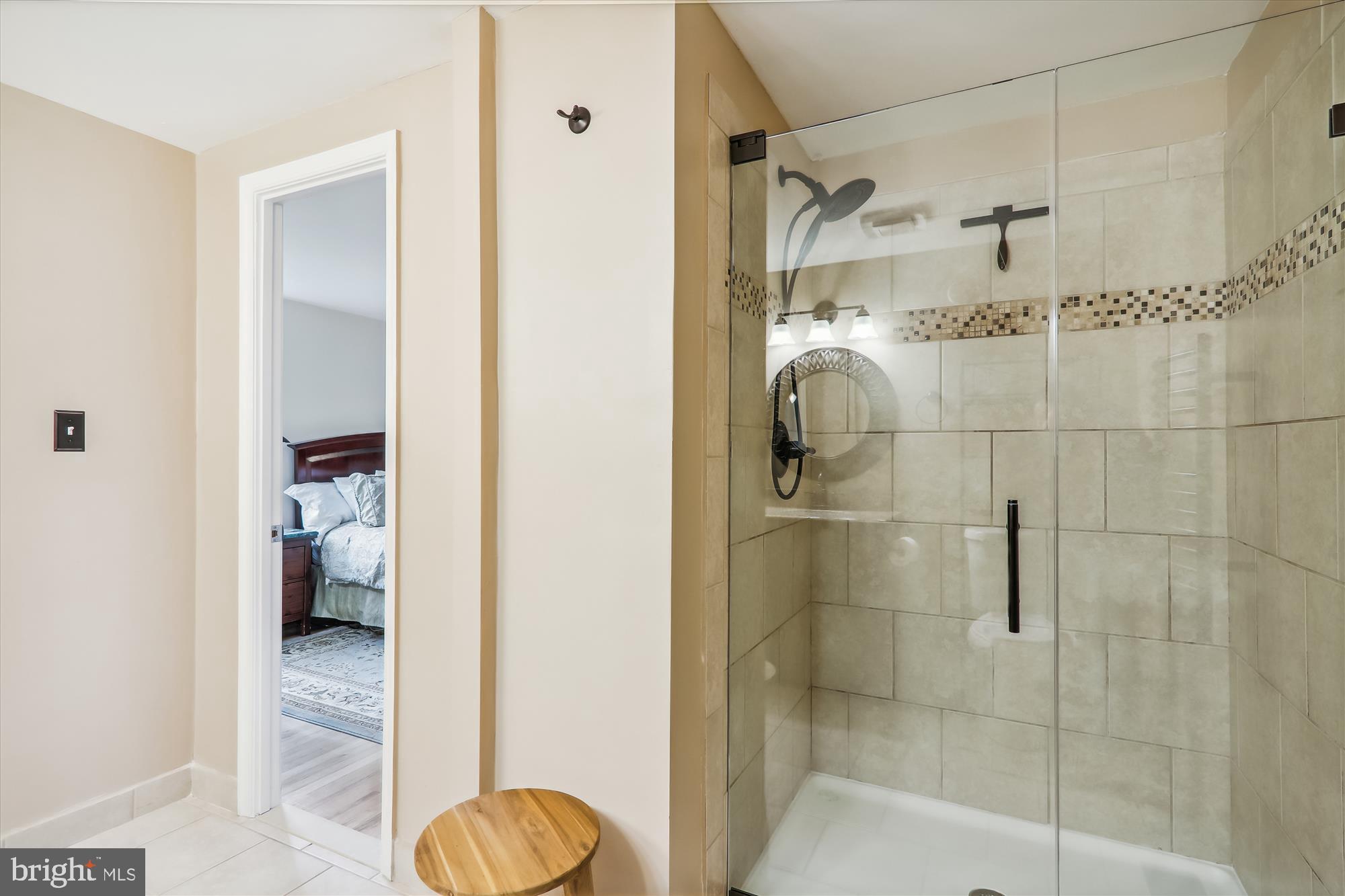 2804 Hewitt Avenue Silver Spring, MD 20906 - Photo 21 of 34 Renovated primary shower with pretty accent tile