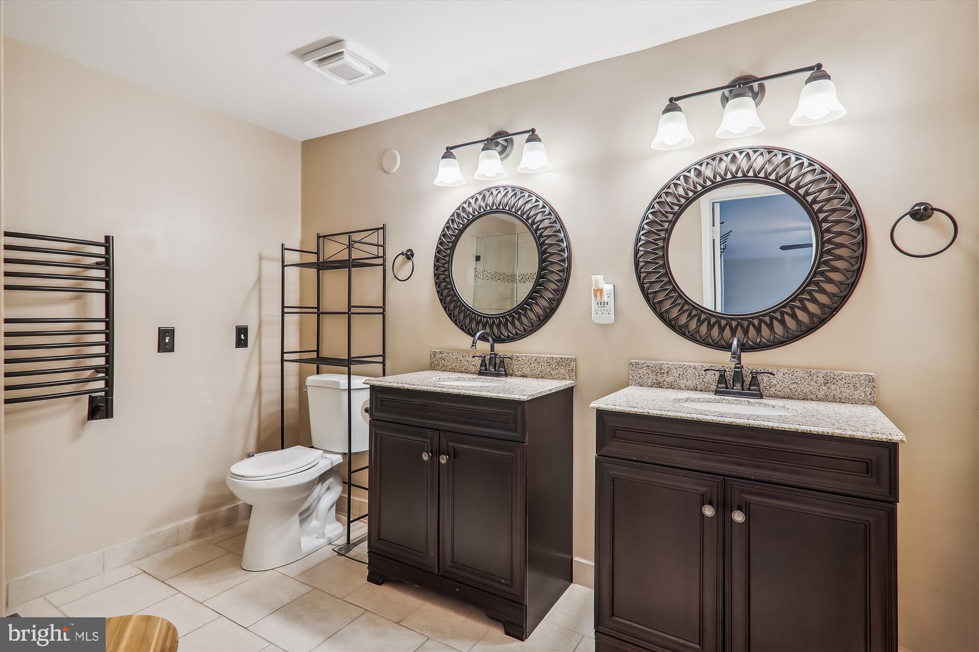 2804 Hewitt Avenue Silver Spring, MD 20906 - Photo 22 of 34 Primary Bath twin sinks and heated towel bars