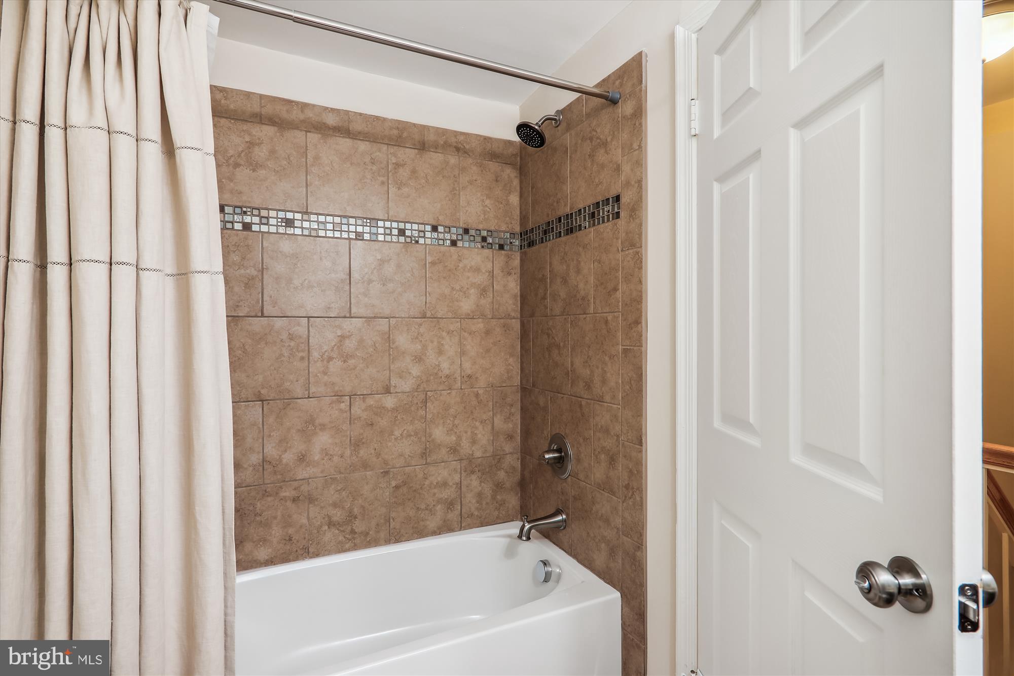 2804 Hewitt Avenue Silver Spring, MD 20906 - Photo 26 of 34 Upper level hall full bath with accent tile