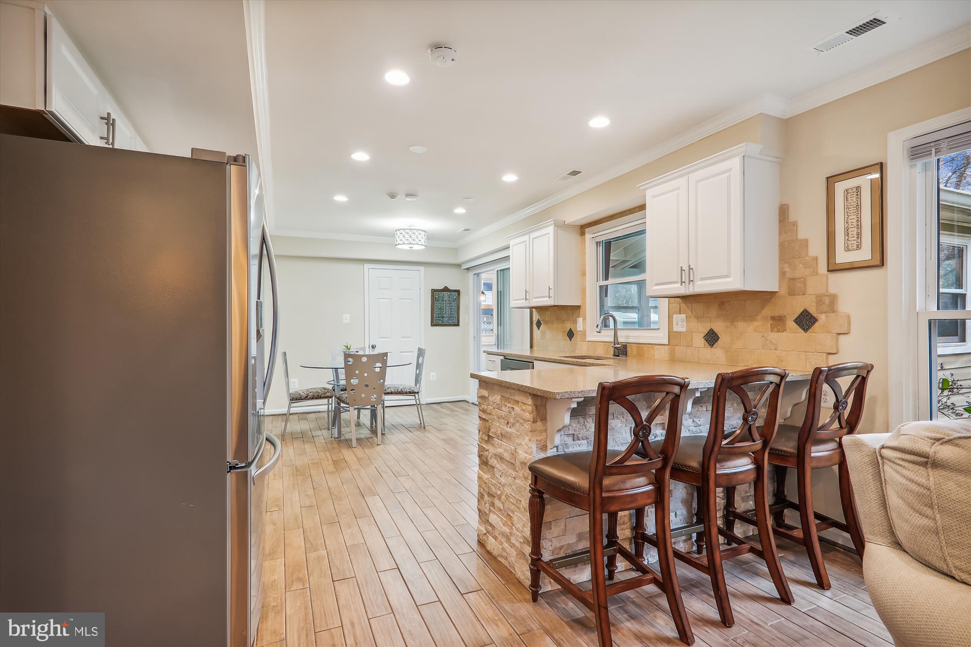 2804 Hewitt Avenue Silver Spring, MD 20906 - Photo 9 of 34 Custom kitchen with breakfast bar