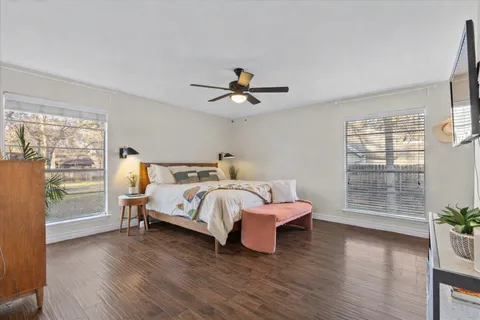 a bed room with a bed and a window