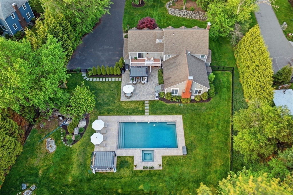 85 Old Farm Road Milton, MA 02186 - Photo 2 of 42 an aerial view of a house with a garden and trees