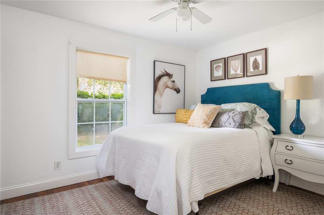 3496 1st Street Southwest Vero Beach, FL 32968 - Photo 14 of 30 a bedroom with a bed and a window