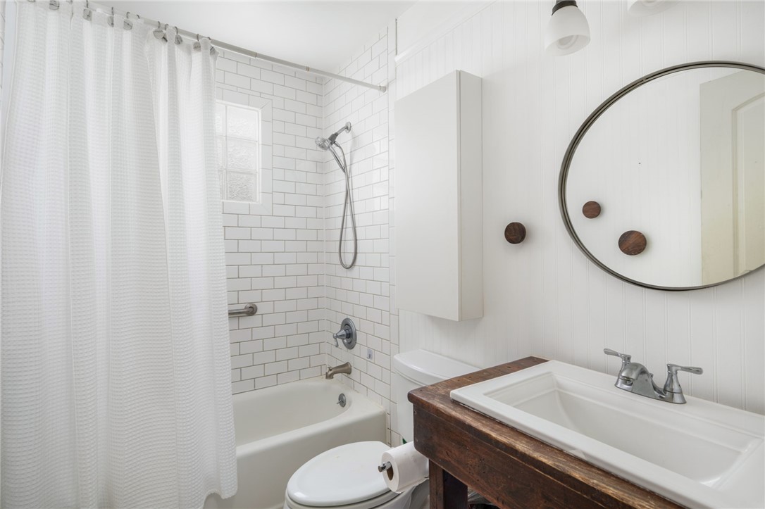 3496 1st Street Southwest Vero Beach, FL 32968 - Photo 16 of 30 a bathroom with a sink and a mirror