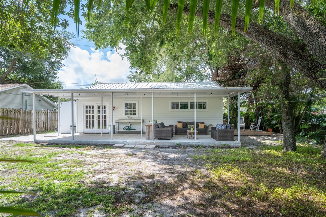 3496 1st Street Southwest Vero Beach, FL 32968 - Photo 2 of 30 a front view of house with yard and seating space