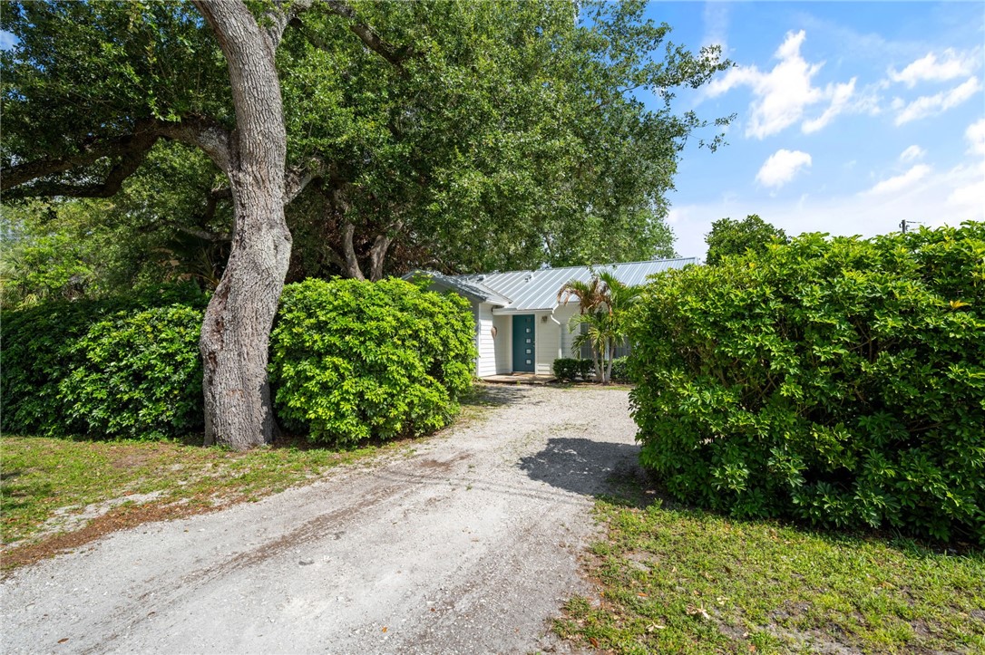 3496 1st Street Southwest Vero Beach, FL 32968 - Photo 30 of 30 a view of a house with a street