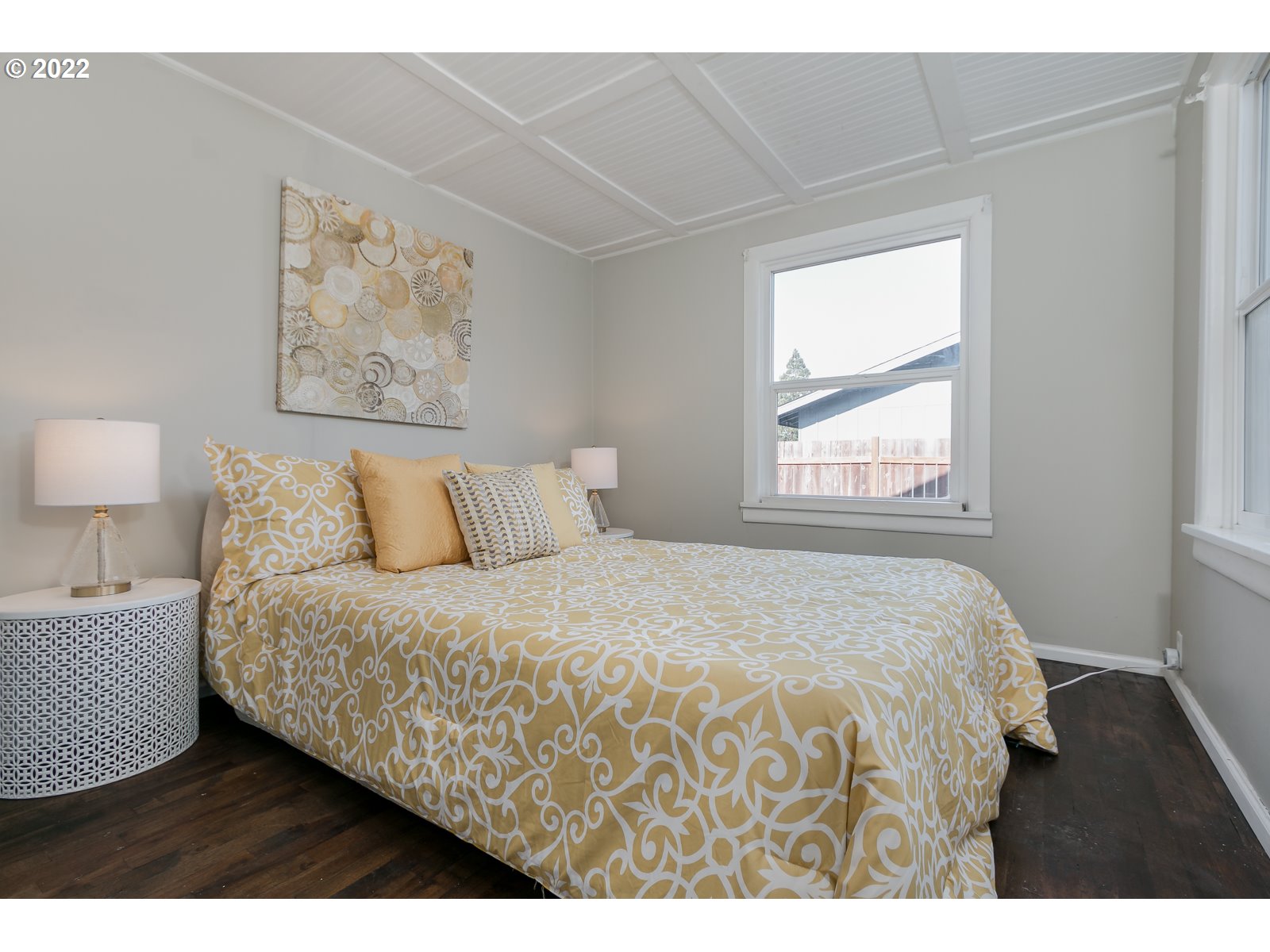 428 18th Street Springfield, OR 97477 - Photo 13 of 22 a bedroom with a bed and a night stand