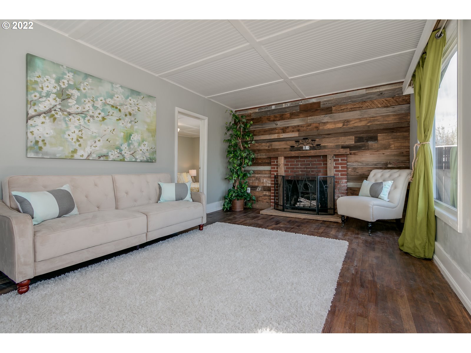 428 18th Street Springfield, OR 97477 - Photo 4 of 22 a living room with furniture and a fireplace